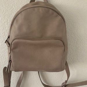 Small tan backpack